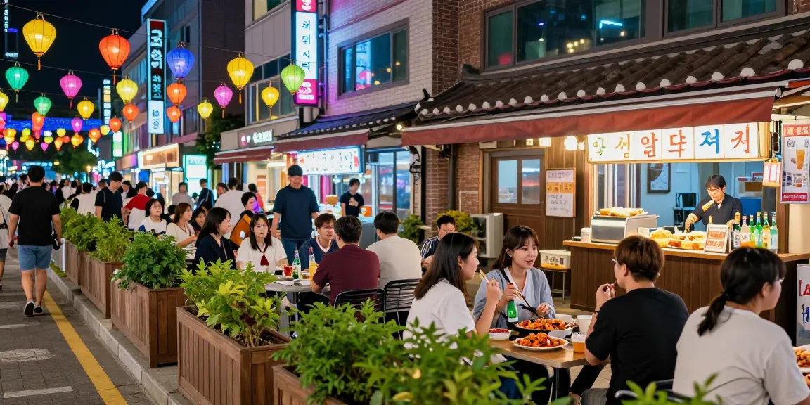Enjoying 상봉동 한국관나이트 with friends, traditional snacks and drinks creating a vibrant nightlife scene.